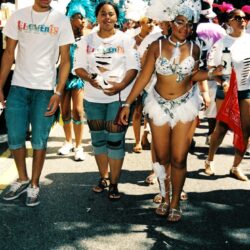 Colorful carnival parade with feathered costumes