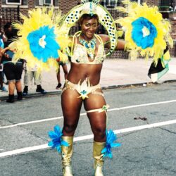 Carnival dancer in blue and yellow costume