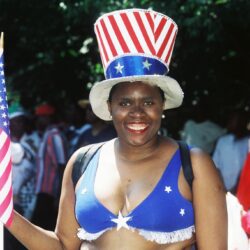 Smiling person in patriotic American flag outfit