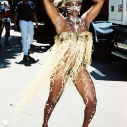 Carnival dancer in straw costume and body paint