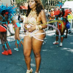 Woman in colorful carnival costume at parade