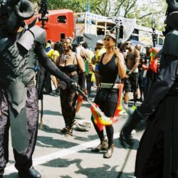 Dancers and performers in horned costumes