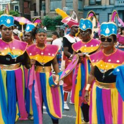 Colorful carnival parade participants in vibrant costumes