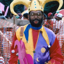 Bearded man in horned jester costume