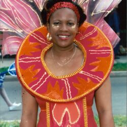 Smiling woman in colorful carnival costume
