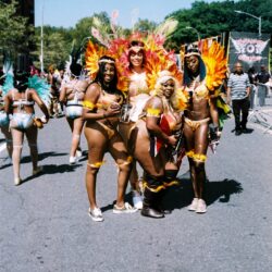 Group of women in colorful carnival costumes