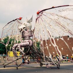 Giant mechanical dragon float in parade