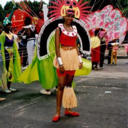 Woman in colorful carnival costume and headdress
