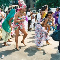 Colorful dancers at street festival parade
