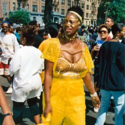 Woman in yellow outfit at street festival