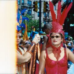 Woman in red carnival costume at parade