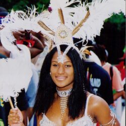 Woman in white feathered carnival costume