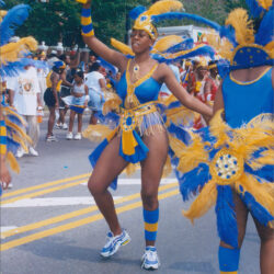 Carnival parade dancer in blue and yellow costume