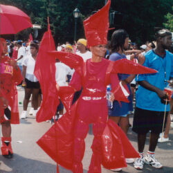 Parade participant in red lobster costume