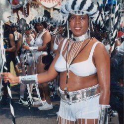 Woman in white feathered carnival costume
