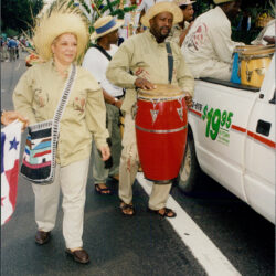 Street parade drummers in straw hats