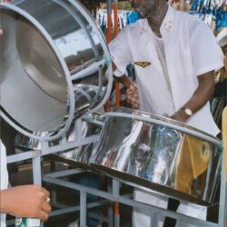 Steel drum musician performing at a festival.