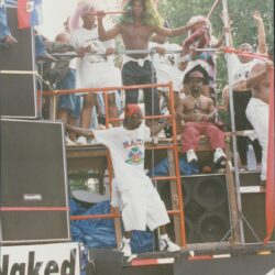 People dancing on a festival float.