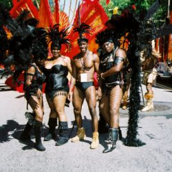 Group of carnival dancers in feathered costumes